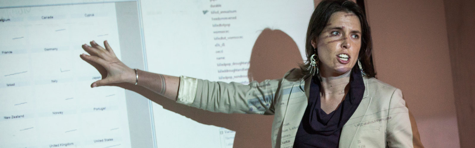 woman giving presentation using projector 